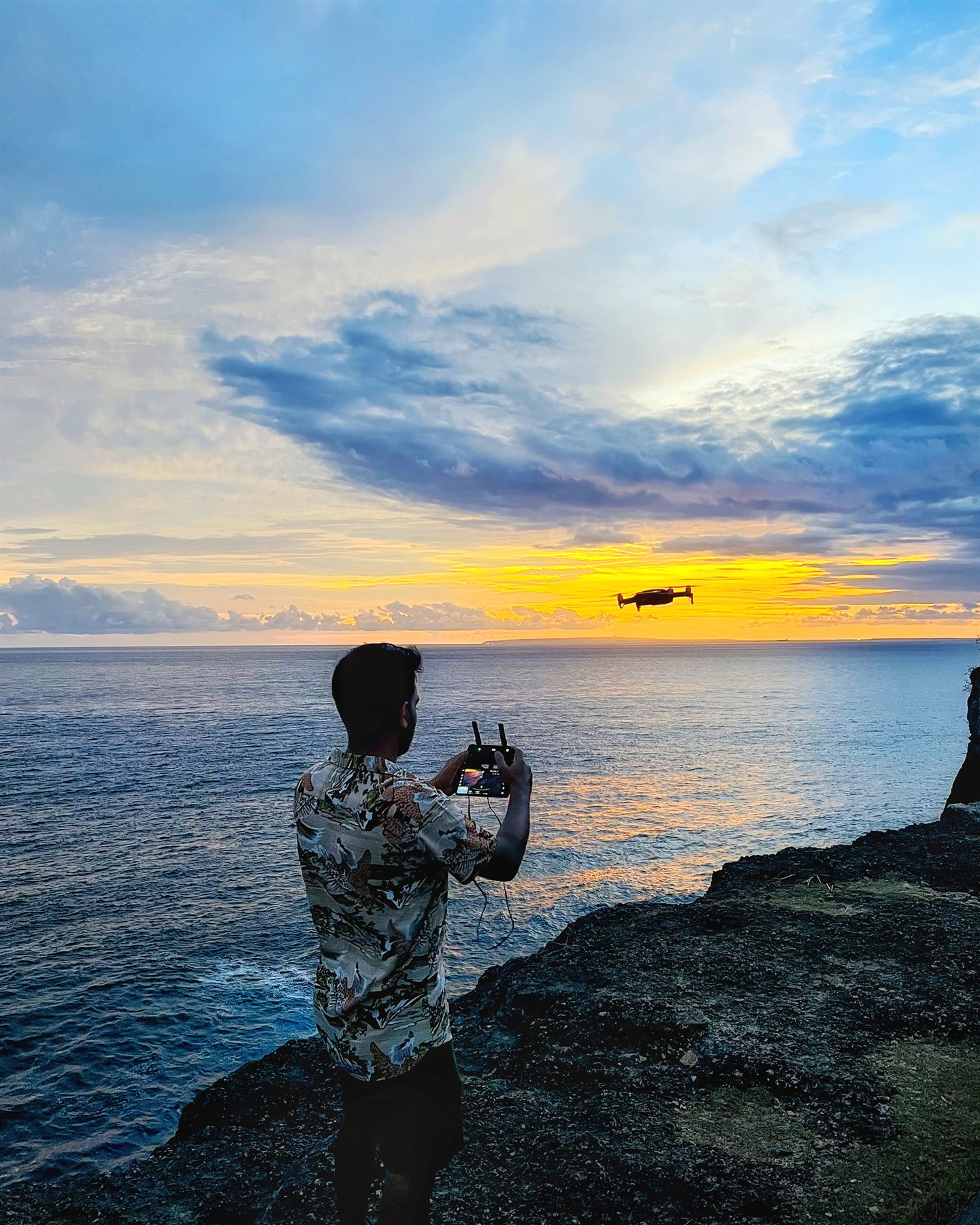 Kshitiz Bathwal · Aerial Landscape Photographer overlooking ocean ridge